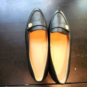 Black leather flats